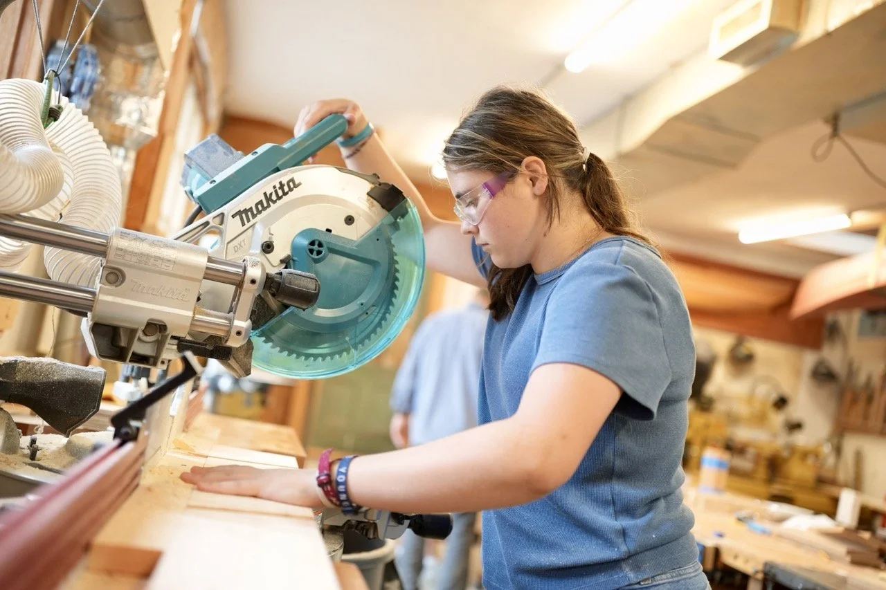 student using table saw